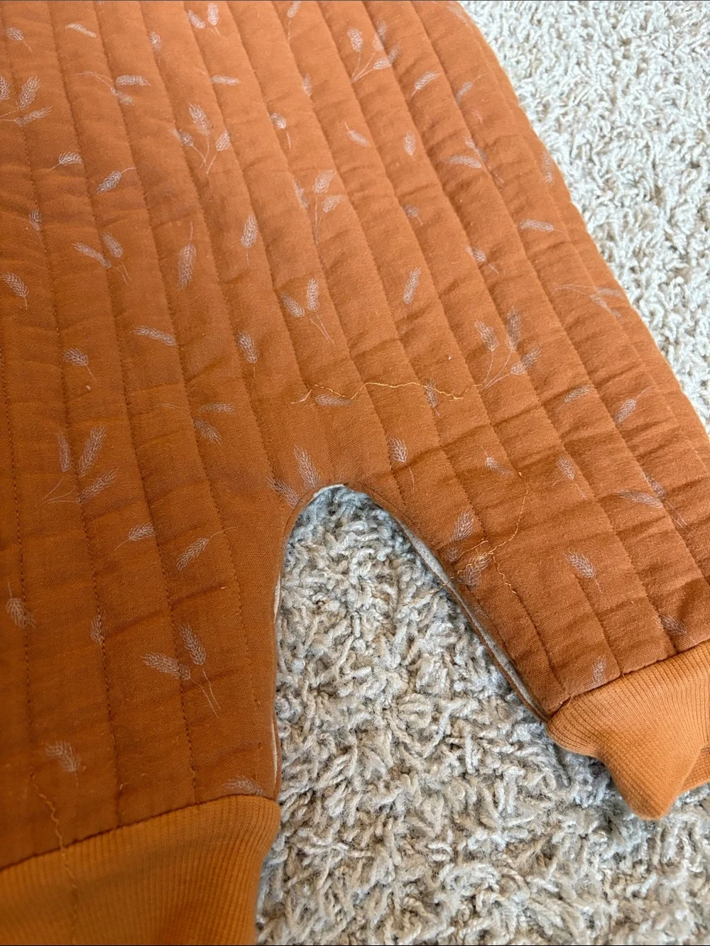 Quilted Sleeveless Baby One-Piece in Rust
